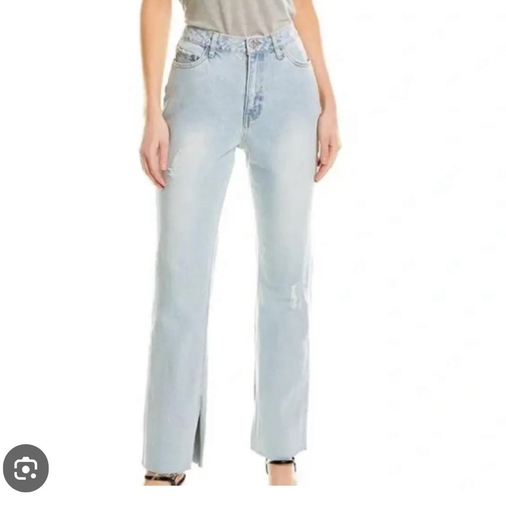 Avec les filles split hem distressed and faded jeans in size 29.